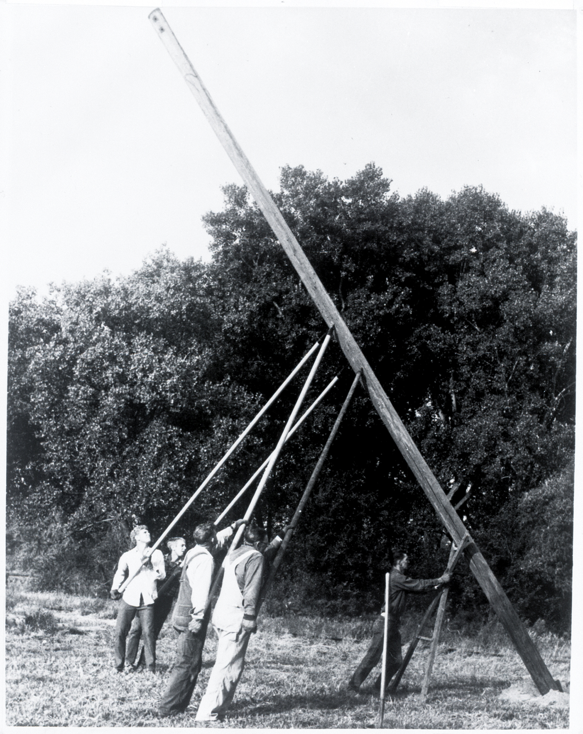 Linemen Setting Poles